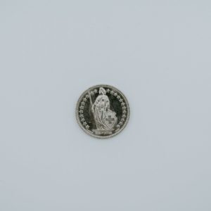 a coin with a picture of a woman on it